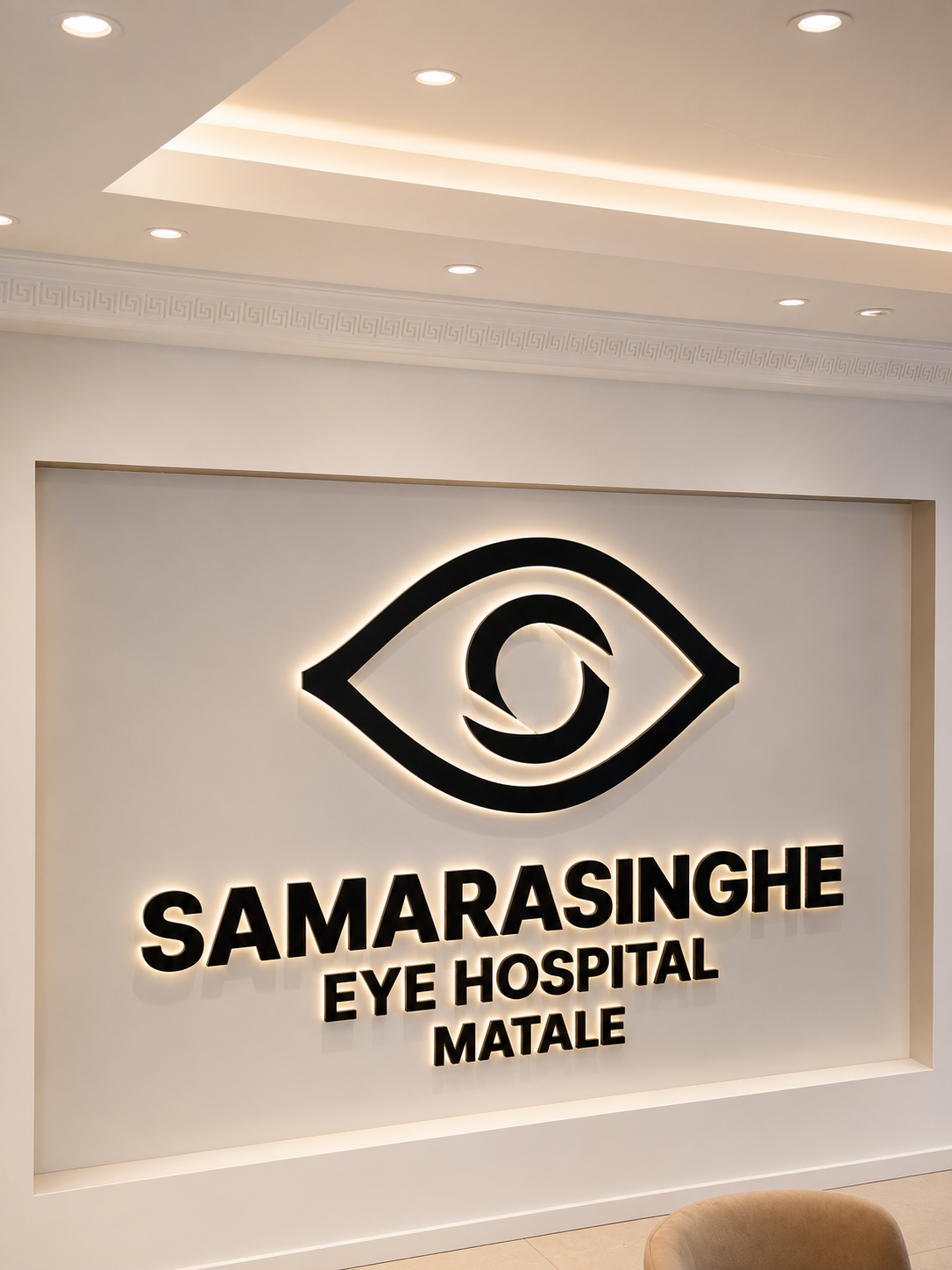 An elderly Sri Lankan woman receiving an eye examination from a female optometrist